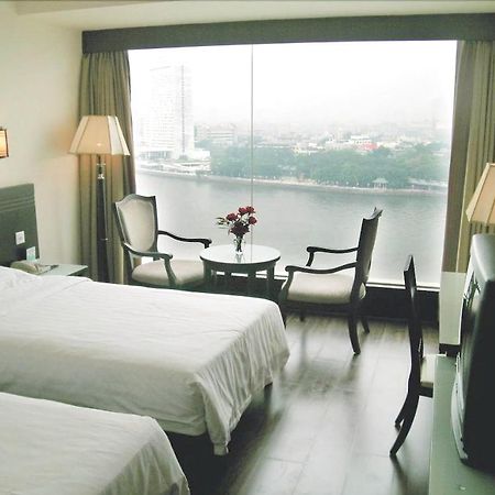 Hotel Jiang Yue Cantón Habitación foto